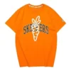 Camiseta com estampa Skechers x Carrots “Laranja Branco Preto”